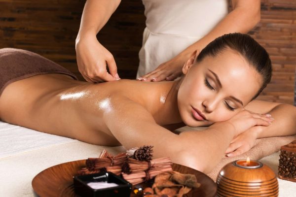 masseur-doing-massage-on-woman-body-in-the-spa-salon-.jpg